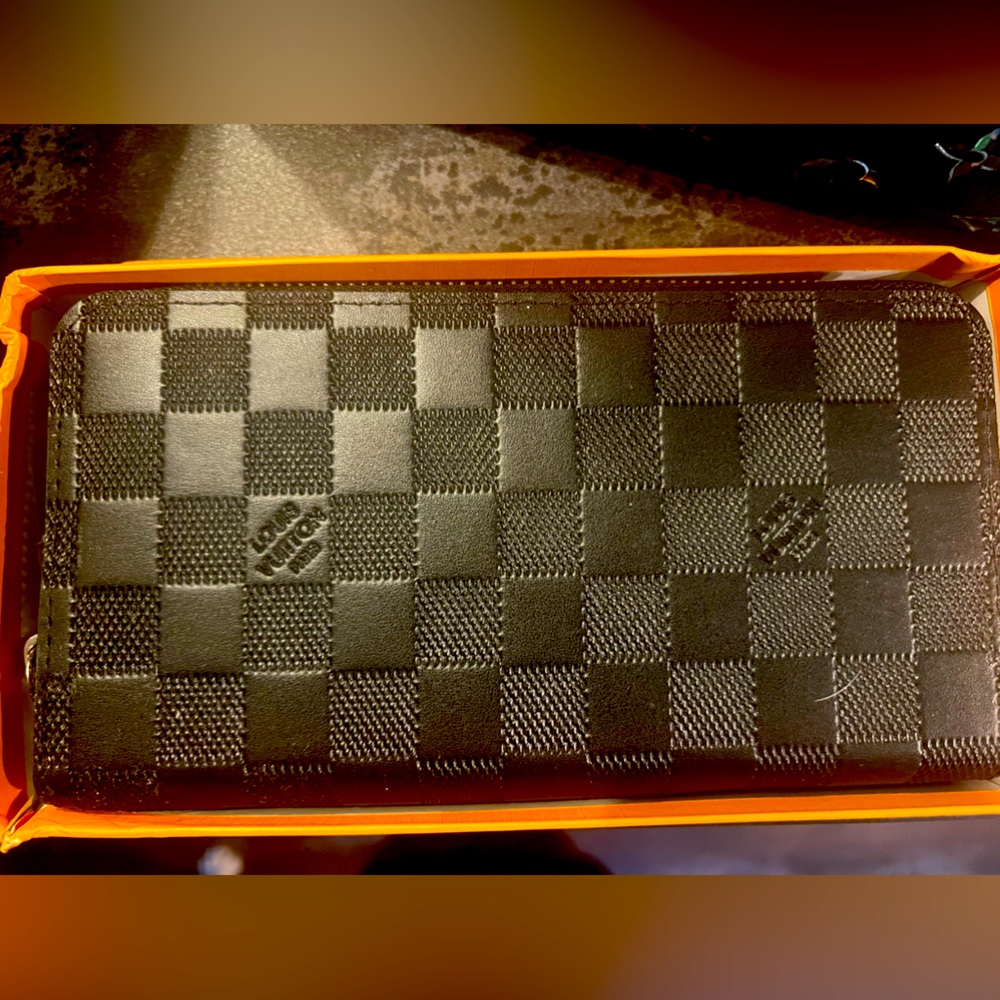 Brand new wallet with two zipped sides
